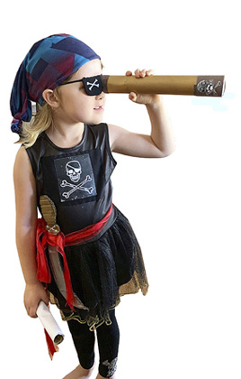 Young child dressed up like a pirate looking through a cardboard telescope at a carttoon pirate boat