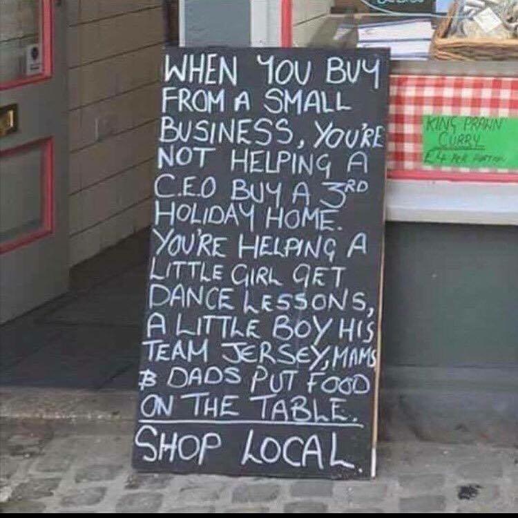 Image: Blackboard at a small business reads: when you buy from a small business you're not helping a CEO buy a third holiday home. You're helping a little girl get dance lessons, a little boy his team jersey, mums & dads put food on the table. Shop Local.